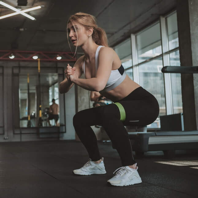squat exercice d'abdos fessiers